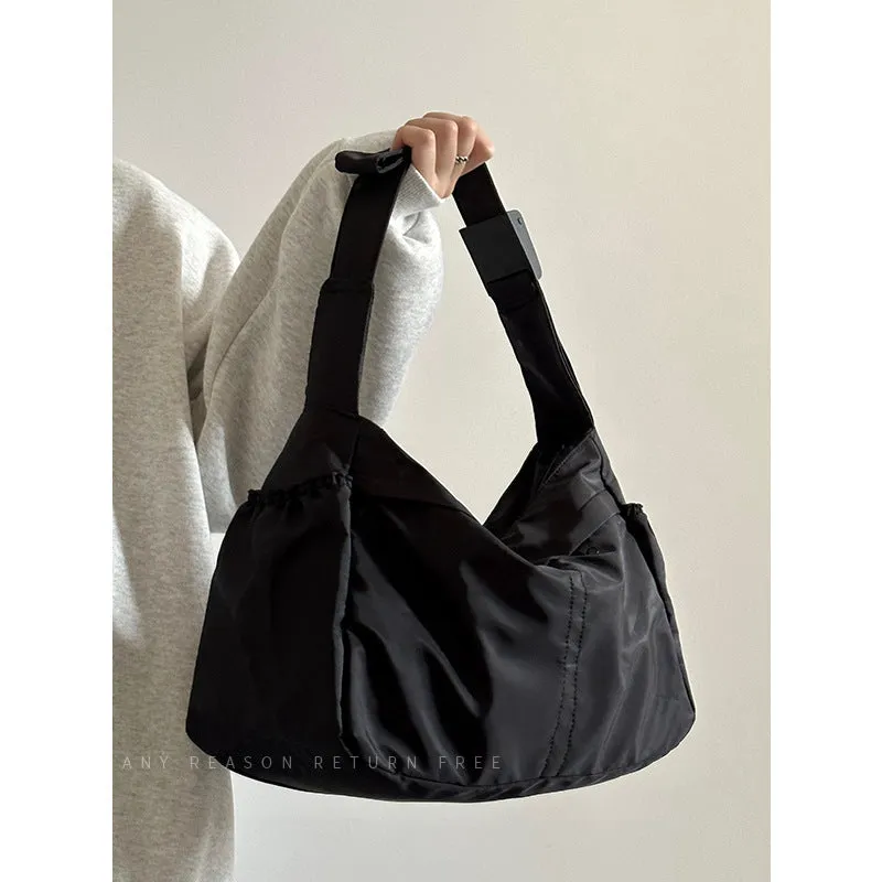Nylon Cloth Dumpling Unisex Simple Style Shoulder Bags